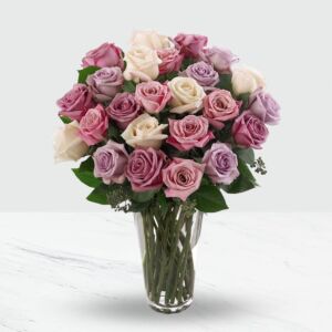 24 pink and purple roses in a vase.